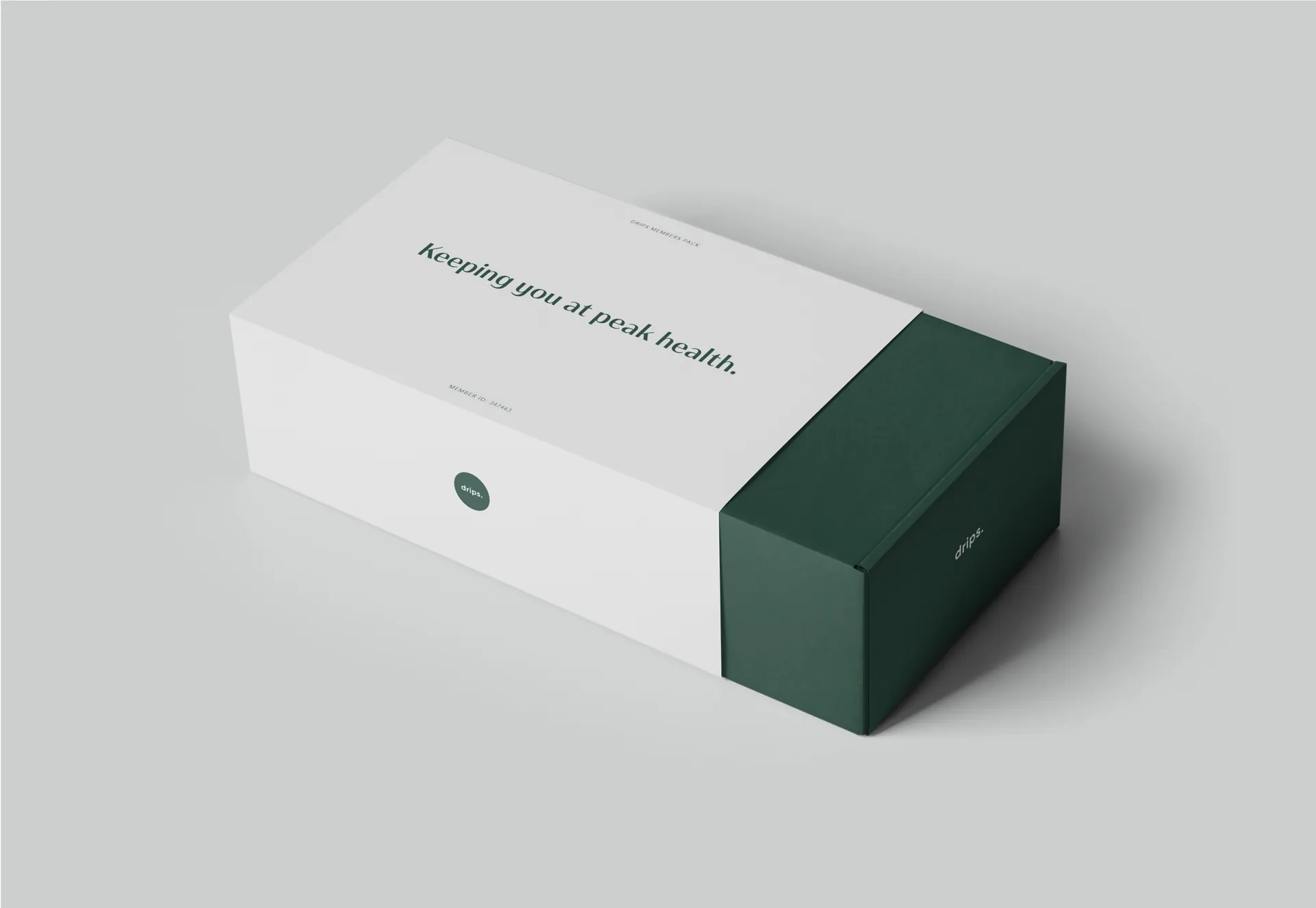A white and green Drips box printed “Keeping you at peak health.”