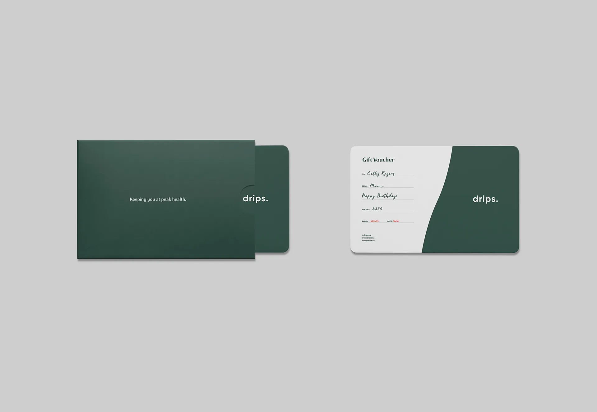 A green Drips gift voucher beside its sleeve.
