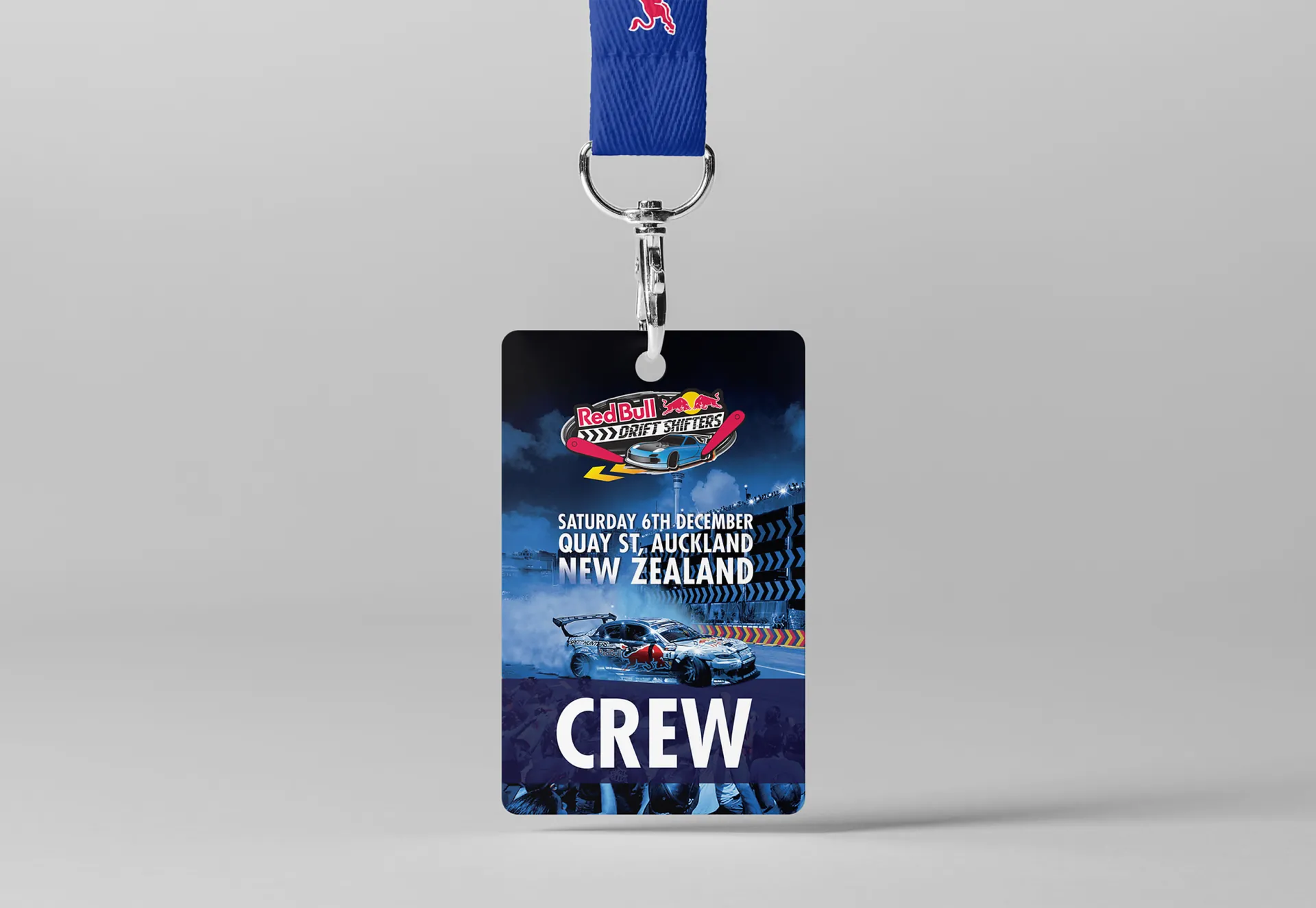 A Red Bull Drift Shifters CREW pass for Quay St, Auckland, on a blue lanyard.