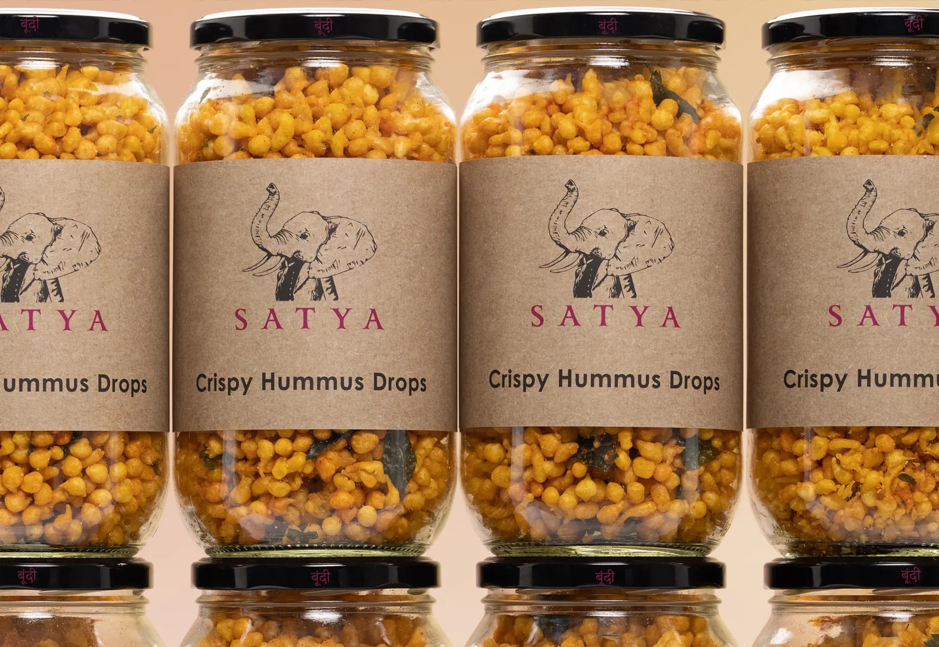 Rows of Satya jars, their kraft labels facing out.